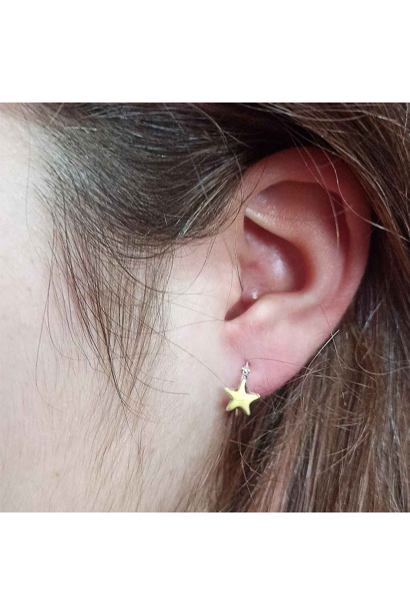 Aros Estrella de Mar Plata de Ley 925 - SomosPlata by Sensibile Aros Estrella de Mar Plata de Ley 925 - SomosPlata by Sensibile